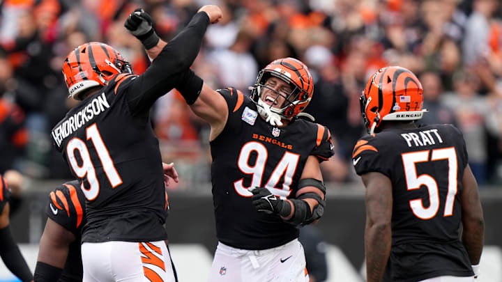 Cincinnati Bengals defensive end Trey Hendrickson (91) and Cincinnati Bengals defensive end Sam Hubbard (94) celebrate a sack in the fourth quarter during an NFL football game between the Seattle Seahawks and the Cincinnati Bengals Sunday, Oct. 15, 2023, at Paycor Stadium in Cincinnati. The Cincinnati Bengals won, 17-13.