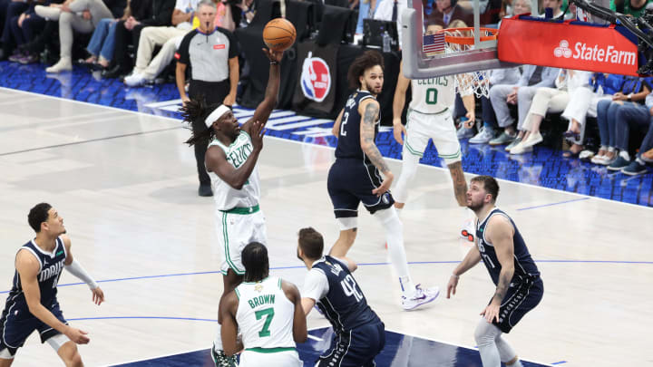 Jun 14, 2024; Dallas, Texas, USA; Boston Celtics guard Jrue Holiday (4) shoots against the Dallas Mavericks during the second half of game four of the 2024 NBA Finals at American Airlines Center. Mandatory Credit: Kevin Jairaj-USA TODAY Sports Jun 14, 2024; Dallas, Texas, USA; Boston Celtics guard Jrue Holiday (4) shoots against the Dallas Mavericks during the second half of game four of the 2024 NBA Finals at American Airlines Center. Mandatory Credit: Kevin Jairaj-USA TODAY Sports