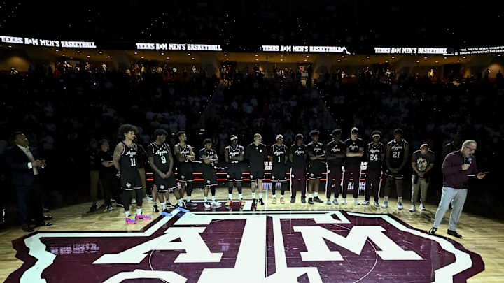 Texas A&M Aggies head coach Buzz Williams honors guard Wade Taylor IV after the game against the Auburn Tigers at Reed Arena. 