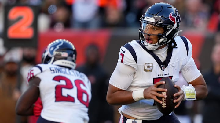 Houston Texans quarterback C.J. Stroud (7) rolls out of the pocket in the fourth quarter