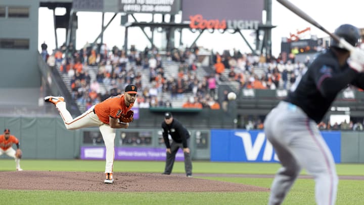 Apr 24, 2026; San Francisco, California, USA; San Francisco Giants starting pitcher Adrian Houser (12) delivers a pitch against the Miami Marlins during the first inning at Oracle Park. Mandatory Credit: D. Ross Cameron-Imagn Images