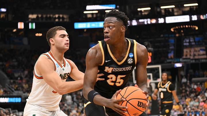 Mar 20, 2026; St. Louis, MO, USA; Missouri Tigers forward Mark Mitchell (25) drives to the basket \against the Miami (FL) Hurricanes during the second half during a first round game of the men's 2026 NCAA Tournament at Enterprise Center. Mandatory Credit: Jeff Curry-Imagn Images