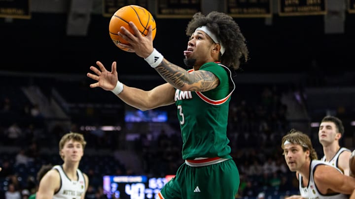 Jan 13, 2026; South Bend, Indiana, USA; Miami (FL) Hurricanes guard Tre Donaldson (3) drives to the basket against the Notre Dame Fighting Irish during the second half at Purcell Pavilion at the Joyce Center. Mandatory Credit: Michael Caterina-Imagn Images