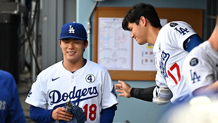 Jun 1, 2025; Los Angeles, California, USA; Los Angeles Dodgers designated hitter Shohei Ohtani (17) congratulates starting pitcher Yoshinobu Yamamoto (18) after the third inning against the New York Yankees at Dodger Stadium. Mandatory Credit: Jonathan Hui-Imagn Images Jun 1, 2025; Los Angeles, California, USA; Los Angeles Dodgers designated hitter Shohei Ohtani (17) congratulates starting pitcher Yoshinobu Yamamoto (18) after the third inning against the New York Yankees at Dodger Stadium. Mandatory Credit: Jonathan Hui-Imagn Images