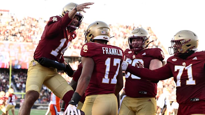 Nov 9, 2024; Chestnut Hill, Massachusetts, USA; Boston College Eagles quarterback Grayson James (14) celebrates with tight end Jeremiah Franklin (17) after a touchdown against the Syracuse Orange during the second half at Alumni Stadium. Mandatory Credit: Brian Fluharty-Imagn Images Nov 9, 2024; Chestnut Hill, Massachusetts, USA; Boston College Eagles quarterback Grayson James (14) celebrates with tight end Jeremiah Franklin (17) after a touchdown against the Syracuse Orange during the second half at Alumni Stadium. Mandatory Credit: Brian Fluharty-Imagn Images