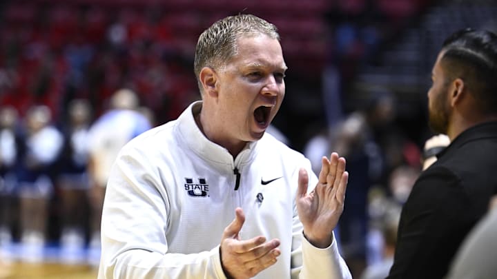 Mar 20, 2026; San Diego, CA, USA; Utah State Aggies head coach Jerrod Calhoun reacts after defeating the Villanova Wildcats in a first round game of the men's 2026 NCAA Tournament at Viejas Arena. Mandatory Credit: Denis Poroy-Imagn Images