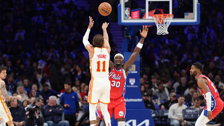 Apr 11, 2025; Philadelphia, Pennsylvania, USA; Atlanta Hawks guard Trae Young (11) shoots the ball against Philadelphia 76ers center Adem Bona (30) in the third quarter at Wells Fargo Center. Mandatory Credit: Kyle Ross-Imagn Images Apr 11, 2025; Philadelphia, Pennsylvania, USA; Atlanta Hawks guard Trae Young (11) shoots the ball against Philadelphia 76ers center Adem Bona (30) in the third quarter at Wells Fargo Center. Mandatory Credit: Kyle Ross-Imagn Images