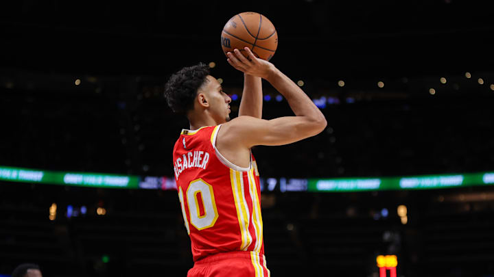 Feb 5, 2025; Atlanta, Georgia, USA; Atlanta Hawks forward Zaccharie Risacher (10) shoots against the San Antonio Spurs in the first quarter at State Farm Arena. Mandatory Credit: Brett Davis-Imagn Images