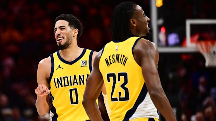 May 13, 2025; Cleveland, Ohio, USA; Indiana Pacers forward Aaron Nesmith (23) and guard Tyrese Haliburton (0) celebrate during the second half of game five against the Cleveland Cavaliers in the second round for the 2025 NBA Playoffs at Rocket Arena. Mandatory Credit: Ken Blaze-Imagn Images