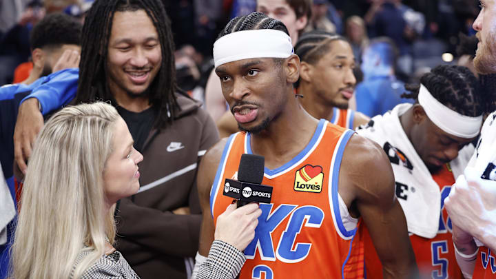 Dec 10, 2024; Oklahoma City, Oklahoma, USA; Oklahoma City Thunder guard Shai Gilgeous-Alexander (2) speaks to a tv reporter after his team defeated the Dallas Mavericks at Paycom Center. Mandatory Credit: Alonzo Adams-Imagn Images