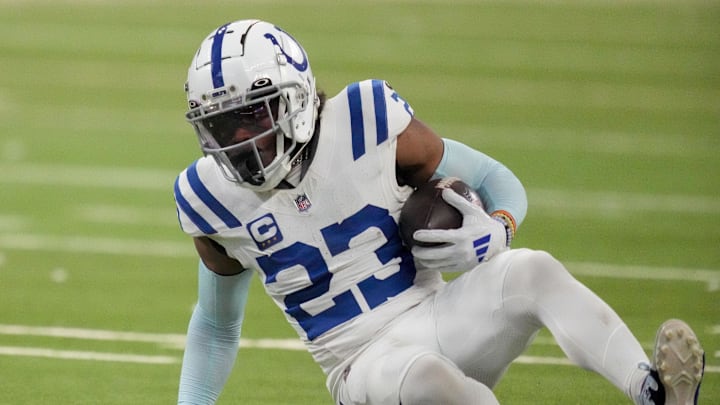 Dec 22, 2024; Indianapolis, Indiana, USA; Indianapolis Colts cornerback Kenny Moore II (23) slides to the turf after intercepting a pass at the end of the game during a game against the Tennessee Titans at Lucas Oil Stadium. Mandatory Credit: Christine Tannous/USA Today Network via Imagn Images Dec 22, 2024; Indianapolis, Indiana, USA; Indianapolis Colts cornerback Kenny Moore II (23) slides to the turf after intercepting a pass at the end of the game during a game against the Tennessee Titans at Lucas Oil Stadium. Mandatory Credit: Christine Tannous/USA Today Network via Imagn Images