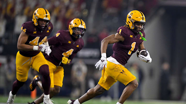 Dec 7, 2024; Arlington, TX, USA; Arizona State Sun Devils linebacker Keyshaun Elliott (44) and defensive back Myles Rowser (4) and defensive back Keith Abney II (1) in action during the game between the Iowa State Cyclones and the Arizona State Sun Devils at AT&T Stadium. Mandatory Credit: Jerome Miron-Imagn Images