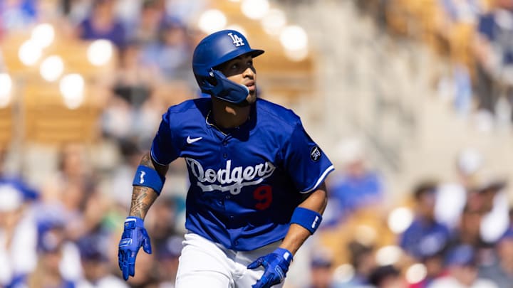 Feb 20, 2025; Phoenix, Arizona, USA; Los Angeles Dodgers outfielder Eddie Rosario rounds the bases after hitting a two run home run against the Chicago Cubs during a spring training game at Camelback Ranch-Glendale. Mandatory Credit: Mark J. Rebilas-Imagn Images
Feb 20, 2025; Phoenix, Arizona, USA; Los Angeles Dodgers outfielder Eddie Rosario rounds the bases after hitting a two run home run against the Chicago Cubs during a spring training game at Camelback Ranch-Glendale. Mandatory Credit: Mark J. Rebilas-Imagn Images