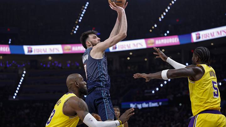 May 7, 2026; Oklahoma City, Oklahoma, USA; Oklahoma City Thunder center Chet Holmgren (7) shoots over Los Angeles Lakers center Deandre Ayton (5) in the second half during game two of the second round of the 2026 NBA Playoffs at Paycom Center. Mandatory Credit: Alonzo Adams-Imagn Images