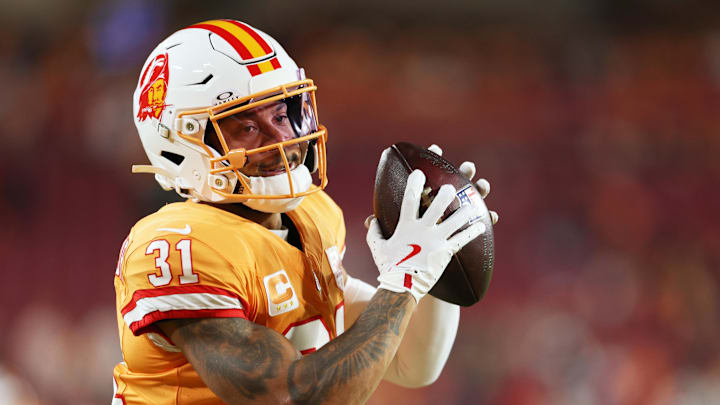 Dec 11, 2025; Tampa, Florida, USA; Tampa Bay Buccaneers safety Antoine Winfield Jr. (31) catches the ball during warms up before the game against the Atlanta Falcons at Raymond James Stadium. Mandatory Credit: Nathan Ray Seebeck-Imagn Images