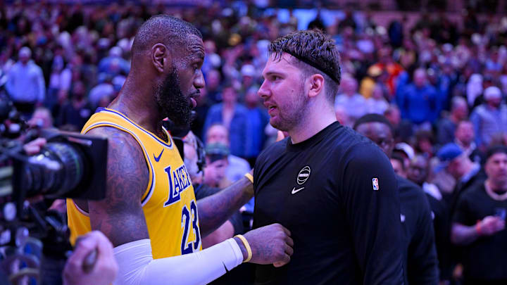 Dec 12, 2023; Dallas, Texas, USA; Los Angeles Lakers forward LeBron James (23) talks with Dallas Mavericks guard Luka Doncic (77) after the Mavericks defeat the Lakes at the American Airlines Center. Mandatory Credit: Jerome Miron-Imagn Images