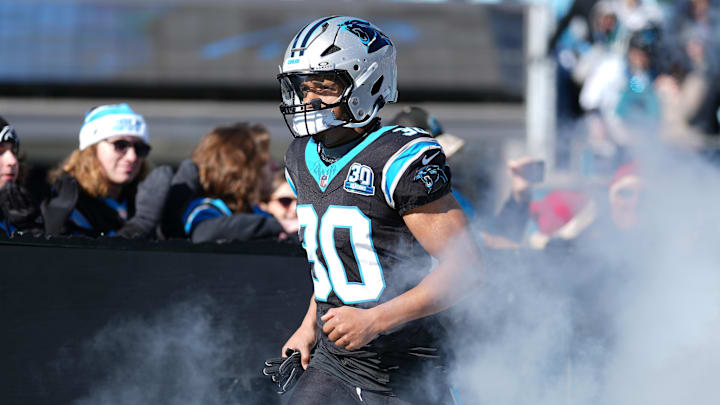 Carolina Panthers running back Chuba Hubbard takes the field during the first quarter against the Arizona Cardinals Carolina Panthers running back Chuba Hubbard takes the field during the first quarter against the Arizona Cardinals