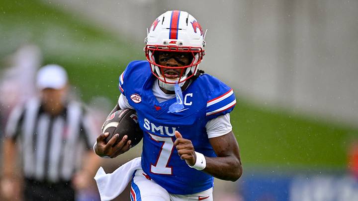 Oct 3, 2026; Dallas, Texas, USA; SMU Mustangs quarterback Kevin Jennings (7) runs with the ball against the Boston College Eagles during the first half at Gerald J. Ford Stadium. Mandatory Credit: Jerome Miron-Imagn Images Oct 3, 2026; Dallas, Texas, USA; SMU Mustangs quarterback Kevin Jennings (7) runs with the ball against the Boston College Eagles during the first half at Gerald J. Ford Stadium. Mandatory Credit: Jerome Miron-Imagn Images