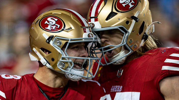 San Francisco 49ers quarterback Brock Purdy (L) and tight end George Kittle (R)