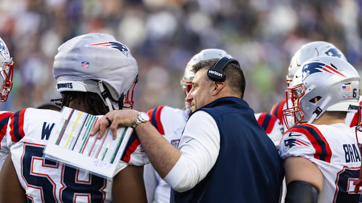 Feb 8, 2026; Santa Clara, CA, USA; New England Patriots head coach Mike Vrabel in the huddle with guard Jared Wilson (58) against the Seattle Seahawks during Super Bowl LX at Levi's Stadium. Mandatory Credit: Mark J. Rebilas-Imagn Images