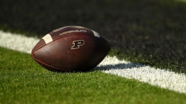 A Purdue Boilermakers game ball sits at the entry of the end zone 