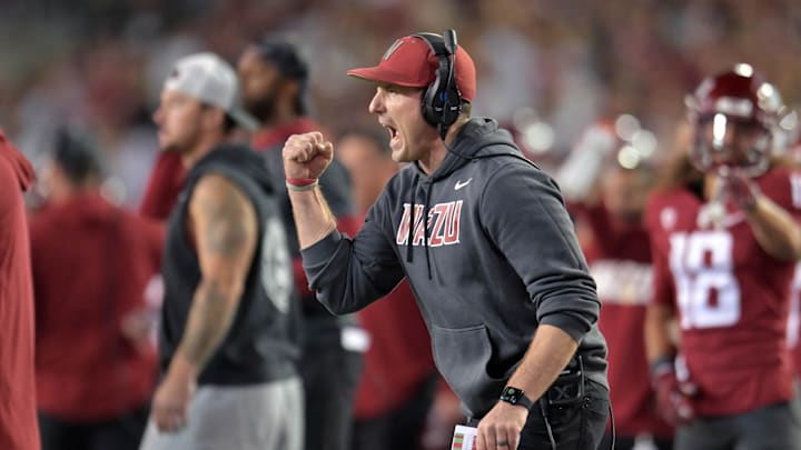 Sep 20, 2024; Pullman, Washington, USA; Washington State Cougars head coach Jake Dickert  celebrates after a play against the San Jose State Spartans in the first half at Gesa Field at Martin Stadium. Mandatory Credit: James Snook-Imagn Images