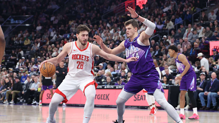 Feb 22, 2025; Salt Lake City, Utah, USA; Houston Rockets center Alperen Sengun (28) goes to the basket against Utah Jazz center Walker Kessler (24) during the second half at Delta Center. Mandatory Credit: Rob Gray-Imagn Images