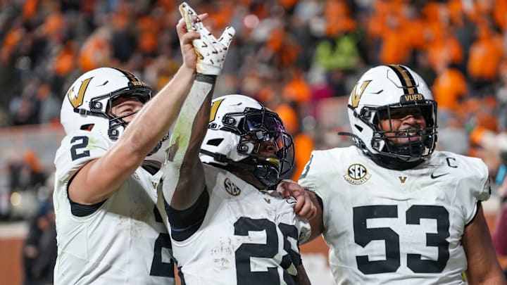 Vanderbilt running back Sedrick Alexander (28) waves to the crowd after scoring a touchdown during a NCAA football game between Tennessee and Vanderbilt at Neyland Stadium in Knoxville, Tenn., on Nov. 29, 2025.