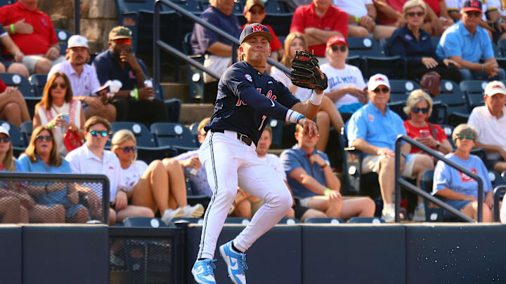 Jun 2, 2025; Oxford, MS, USA; Mississippi Rebels third base Luke Hill (7) fields a ground ball during the second inning against the Murray State Racers. Mandatory Credit: Petre Thomas-Imagn Images
