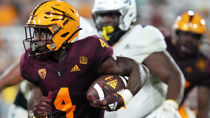 Sep 1, 2022; Tempe, Arizona, USA; Arizona State Sun Devil running back Daniyel Ngata (4) carries the ball against the Northern Arizona Lumberjacks at Sun Devil Stadium.
Football Asu Fb Nau At Asu Sep 1, 2022; Tempe, Arizona, USA; Arizona State Sun Devil running back Daniyel Ngata (4) carries the ball against the Northern Arizona Lumberjacks at Sun Devil Stadium.
Football Asu Fb Nau At Asu