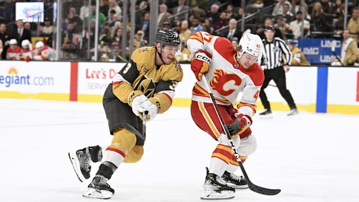 Dec 29, 2024; Las Vegas, Nevada, USA; Vegas Golden Knights defenseman Brayden McNabb (3) chases after Calgary Flames center Connor Zary (47) in the third period of their game at T-Mobile Arena. Mandatory Credit: Candice Ward-Imagn Images