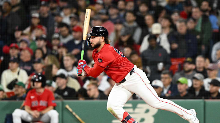 Boston Red Sox right fielder Wilyer Abreu (52) hits a single against the Minnesota Twins during the fourth inning at Fenway Park on Sept 20.