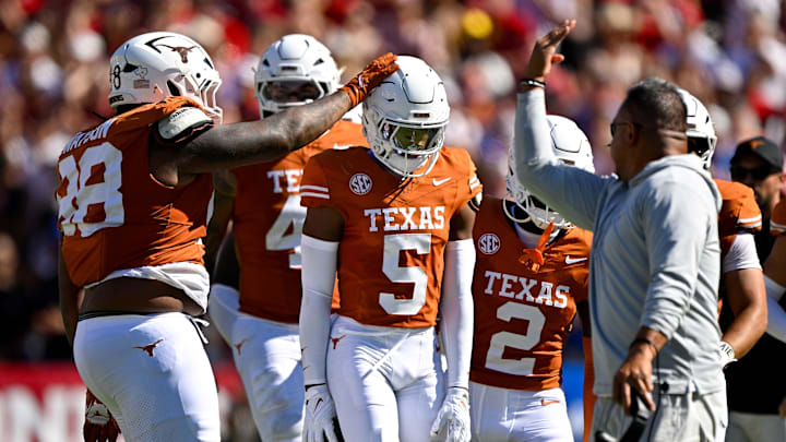 Texas Longhorns defensive back Malik Muhammad (5) celebrates after he intercepts a pass during Red River Rivalry game on Oct. 11, 2025 at the Cotton Bowl in Dallas, Texas. Texas Longhorns defensive back Malik Muhammad (5) celebrates after he intercepts a pass during Red River Rivalry game on Oct. 11, 2025 at the Cotton Bowl in Dallas, Texas.