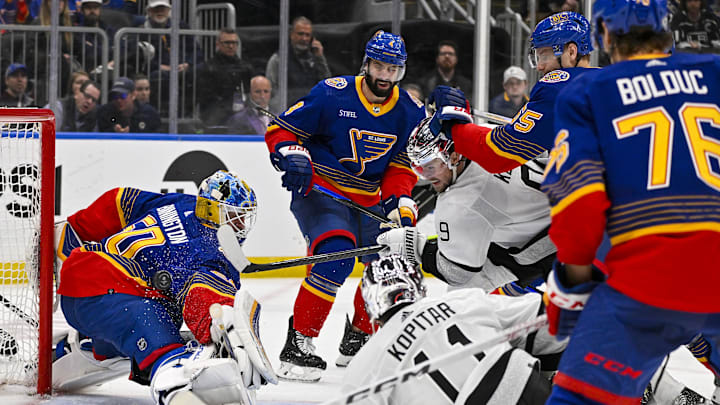 Mar 13, 2024; St. Louis, Missouri, USA;  Los Angeles Kings right wing Adrian Kempe (9) shoots and scores against St. Louis Blues goaltender Jordan Binnington (50) during the third period at Enterprise Center. Mandatory Credit: Jeff Curry-Imagn Images