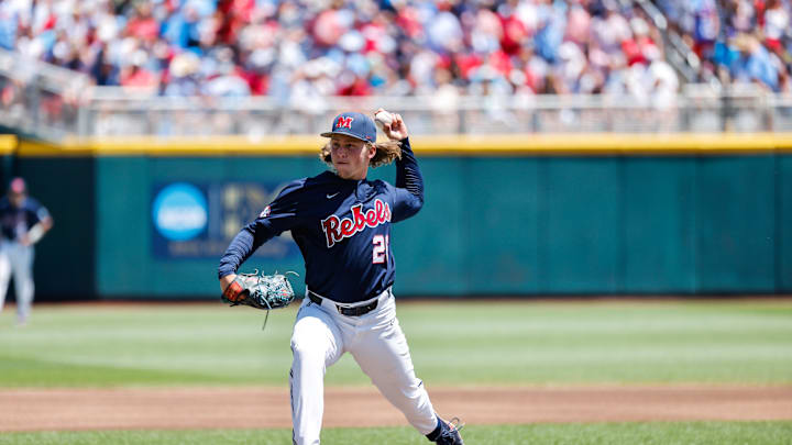 Jun 26, 2022; Omaha, NE, USA; Ole Miss pitcher Hunter Elliott (26) pitches during the first inning against the Oklahoma Sooners at Charles Schwab Field. Mandatory Credit: Jaylynn Nash-Imagn Images
