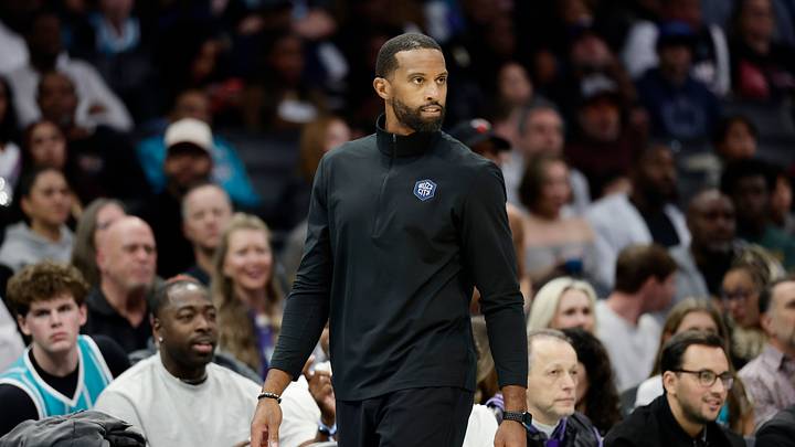 Oct 24, 2026; Charlotte, North Carolina, USA; Charlotte Hornets head coach Charles Lee watches from the sideline during the fourth quarter against the Miami Heat at Spectrum Center. Mandatory Credit: Brian Westerholt-Imagn Images Oct 24, 2026; Charlotte, North Carolina, USA; Charlotte Hornets head coach Charles Lee watches from the sideline during the fourth quarter against the Miami Heat at Spectrum Center. Mandatory Credit: Brian Westerholt-Imagn Images
