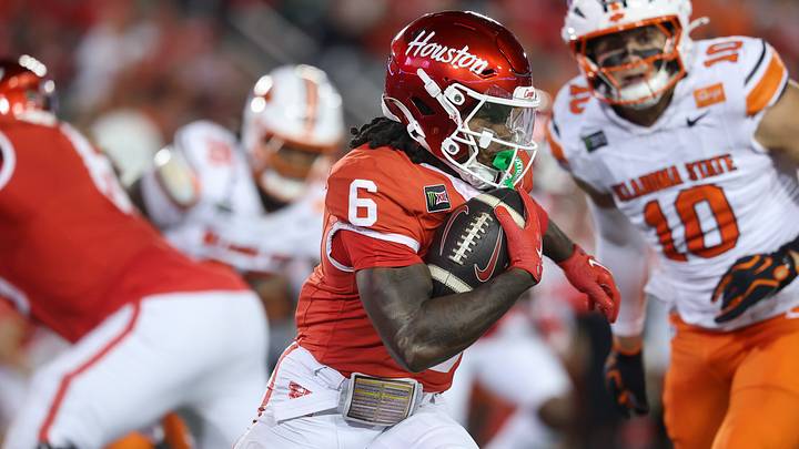 Houston RB Re'shaun Sanford II runs with the ball during the third quarter against Oklahoma State at TDECU Stadium. Mandatory Credit: Troy Taormina-Imagn Images