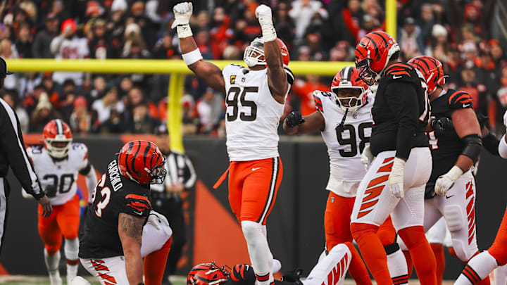 Jan 4, 2026; Cincinnati, Ohio, USA; Cleveland Browns defensive end Myles Garrett (95) celebrates after sacking Cincinnati Bengals quarterback Joe Burrow (9) during the fourth quarter at Paycor Stadium. The play set a new NFL single season sack record by Garrett. Mandatory Credit: Joseph Maiorana-Imagn Images