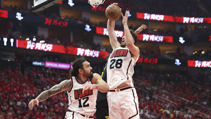 May 4, 2025; Houston, Texas, USA; Houston Rockets center Alperen Sengun (28) grabs a rebound during the first quarter of game seven of first round for the 2025 NBA Playoffs against the Golden State Warriors at Toyota Center. Mandatory Credit: Troy Taormina-Imagn Images