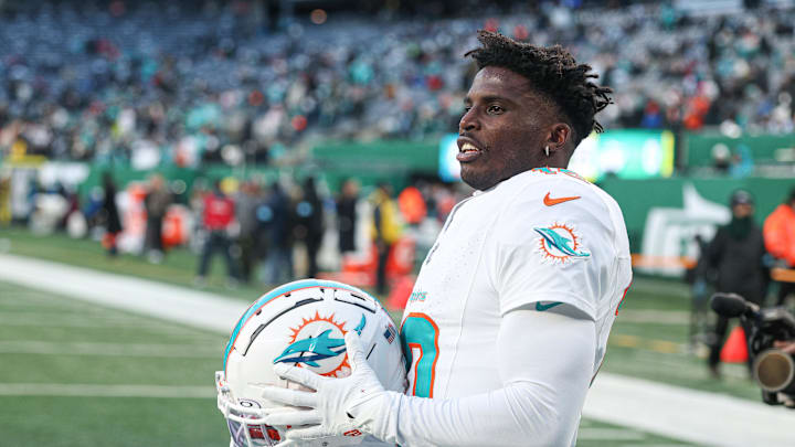 Jan 5, 2025; East Rutherford, New Jersey, USA; Miami Dolphins wide receiver Tyreek Hill (10) on the field before the game against the New York Jets at MetLife Stadium. Mandatory Credit: Vincent Carchietta-Imagn Images
