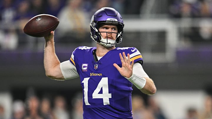 Nov 3, 2024; Minneapolis, Minnesota, USA; Minnesota Vikings quarterback Sam Darnold (14) throws a pass against the Indianapolis Colts during the first quarter at U.S. Bank Stadium.