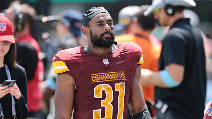 Aug 10, 2024; East Rutherford, New Jersey, USA; Washington Commanders running back Jeremy McNichols (31) walks off the field during the first half against the New York Jets at MetLife Stadium. Mandatory Credit: Vincent Carchietta-Imagn Images