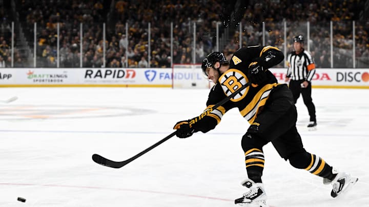 Apr 23, 2026; Boston, Massachusetts, USA; Boston Bruins right wing David Pastrnak (88) attempts a shot against the Buffalo Sabres during the first period of game three of the first round of the 2026 Stanley Cup Playoffs at the TD Garden. Mandatory Credit: Brian Fluharty-Imagn Images