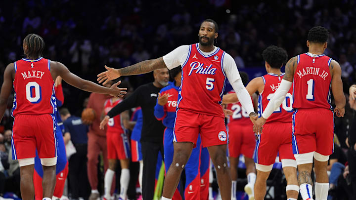 Dec 6, 2024; Philadelphia, Pennsylvania, USA; Philadelphia 76ers center Andre Drummond (5) reacts with guard Tyrese Maxey (0) and forward KJ Martin (1) in the third quarter at Wells Fargo Center. Mandatory Credit: Kyle Ross-Imagn Images