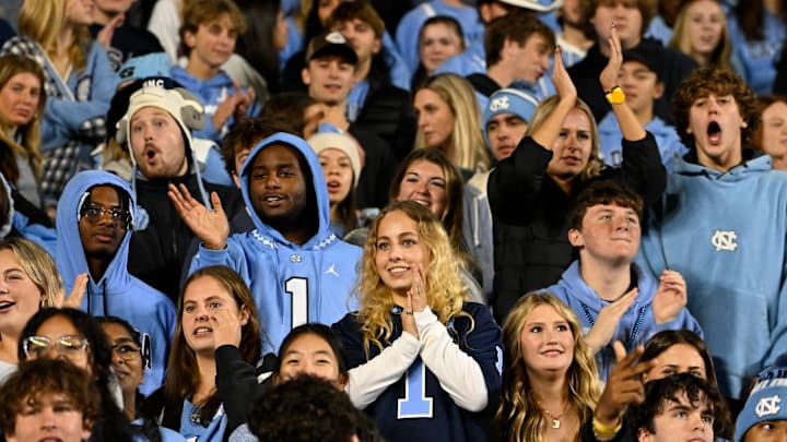 Nov 16, 2024; Chapel Hill, North Carolina, USA; North Carolina Tar Heels fans react in the third quarter at Kenan Memorial Stadium. Mandatory Credit: Bob Donnan-Imagn Images Nov 16, 2024; Chapel Hill, North Carolina, USA; North Carolina Tar Heels fans react in the third quarter at Kenan Memorial Stadium. Mandatory Credit: Bob Donnan-Imagn Images