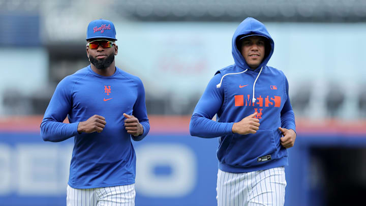 Apr 22, 2026; New York City, New York, USA; New York Mets center fielder Luis Robert Jr. (88) and designated hitter Juan Soto (22) run in the outfield before a game against the Minnesota Twins at Citi Field. Mandatory Credit: Brad Penner-Imagn Images