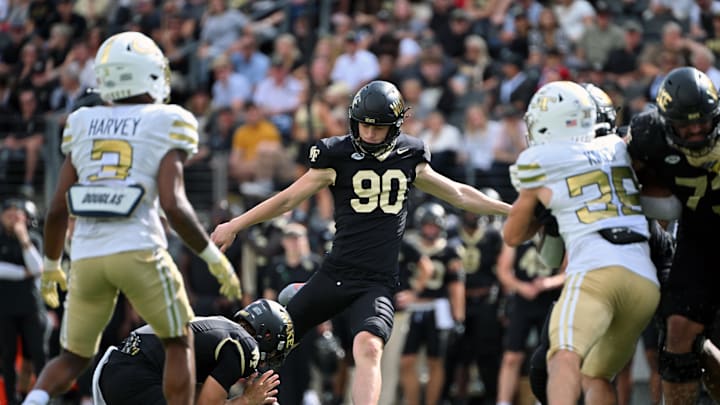 Sep 27, 2025; Winston-Salem, North Carolina, USA;  Wake Forest Demon Deacons kicker Connor Calvert (90) kicks a field goal during the fourth quarter against the Georgia Tech Yellow Jackets at Allegacy Federal Credit Union Stadium. Mandatory Credit: Zachary Taft-Imagn Images