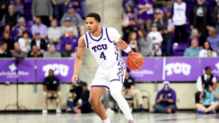 Mar 9, 2024; Fort Worth, Texas, USA; TCU Horned Frogs guard Jameer Nelson Jr. (4) controls the ball during the first half against the UCF Knights at Ed and Rae Schollmaier Arena. Mandatory Credit: Kevin Jairaj-USA TODAY Sports Mar 9, 2024; Fort Worth, Texas, USA; TCU Horned Frogs guard Jameer Nelson Jr. (4) controls the ball during the first half against the UCF Knights at Ed and Rae Schollmaier Arena. Mandatory Credit: Kevin Jairaj-USA TODAY Sports