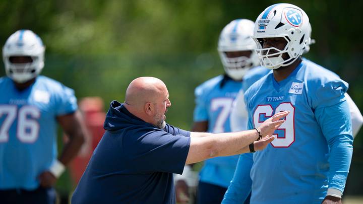 Tennessee Titans offensive line coach Carmen Bricillo works with Tennessee Titans tackle Aamil Wagner (69) during the Titans Rookie Camp Day 2 at Vanderbilt Health Football Center in Nashville, Tenn., Saturday, May 2, 2026.