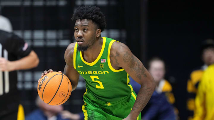 Feb 24, 2024; Berkeley, California, USA; Oregon Ducks guard Jermaine Couisnard (5) dribbles against